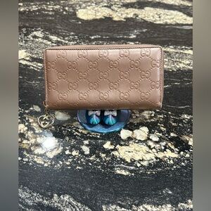 Gucci Rose Gold Wallet with Embossed Logo
